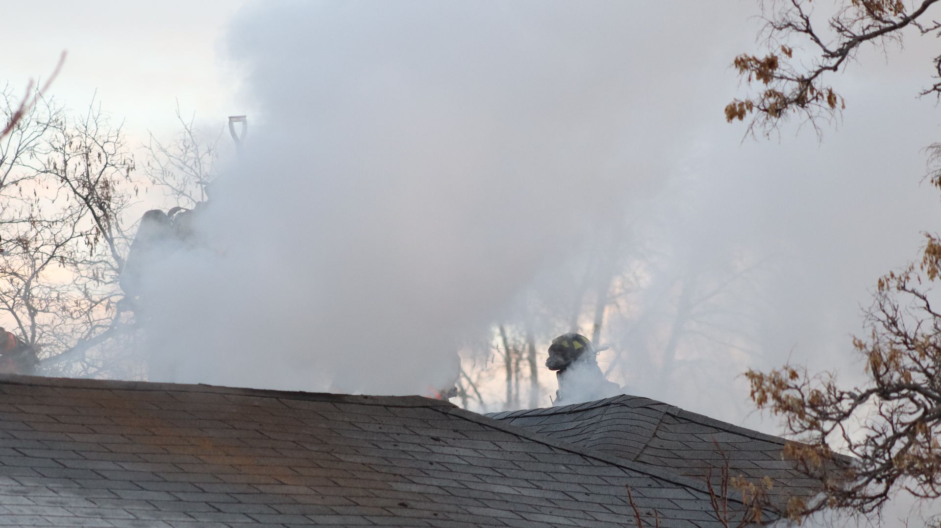 RFD on the rooftop putting out the fire