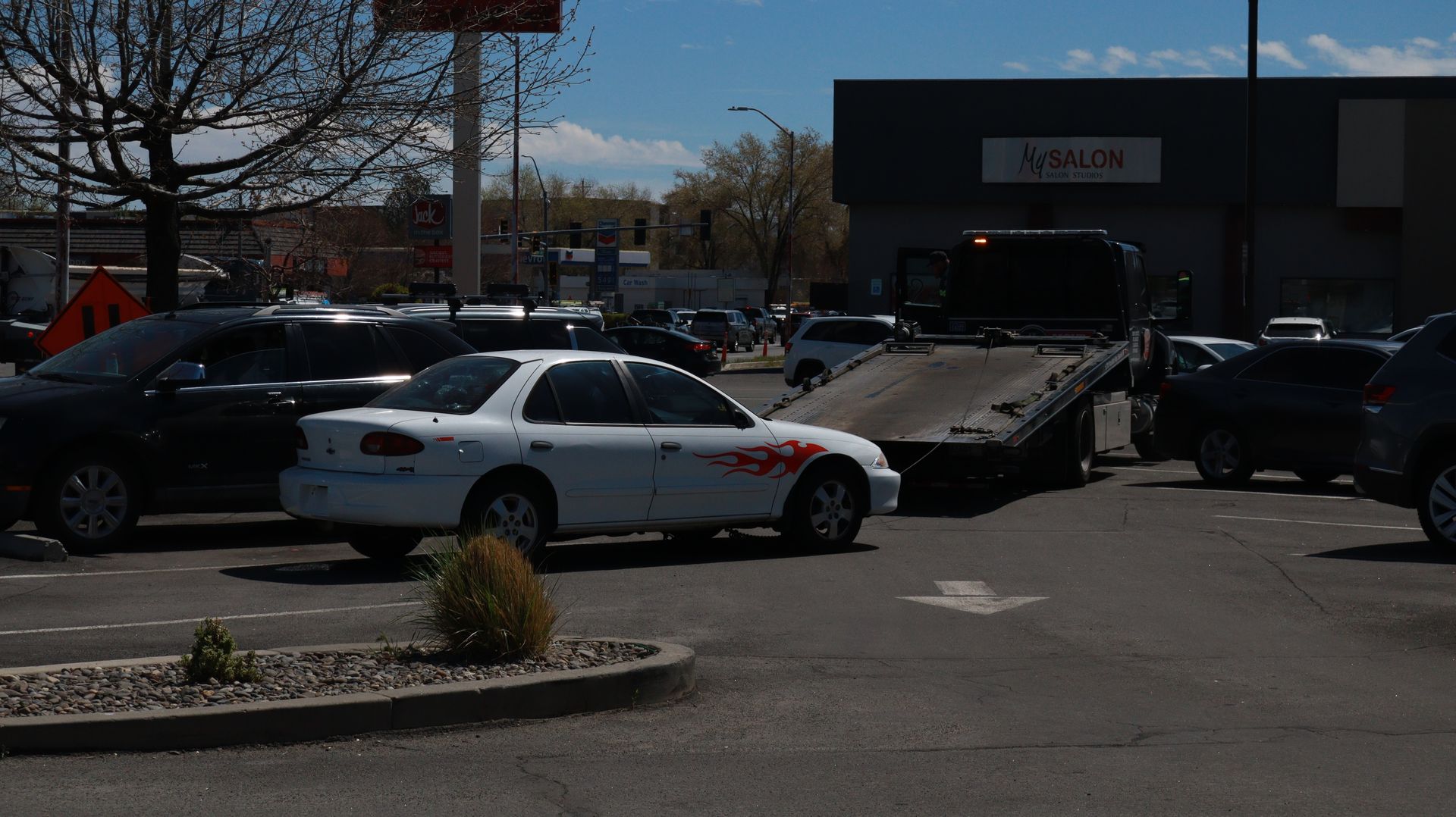 Deadbeat's car getting towed
